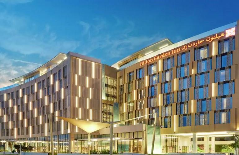 Hilton Garden Inn Muscat Al Khuwair at night